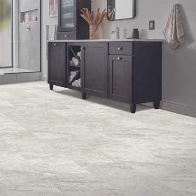 natural stone look lvt in modern gray bathroom